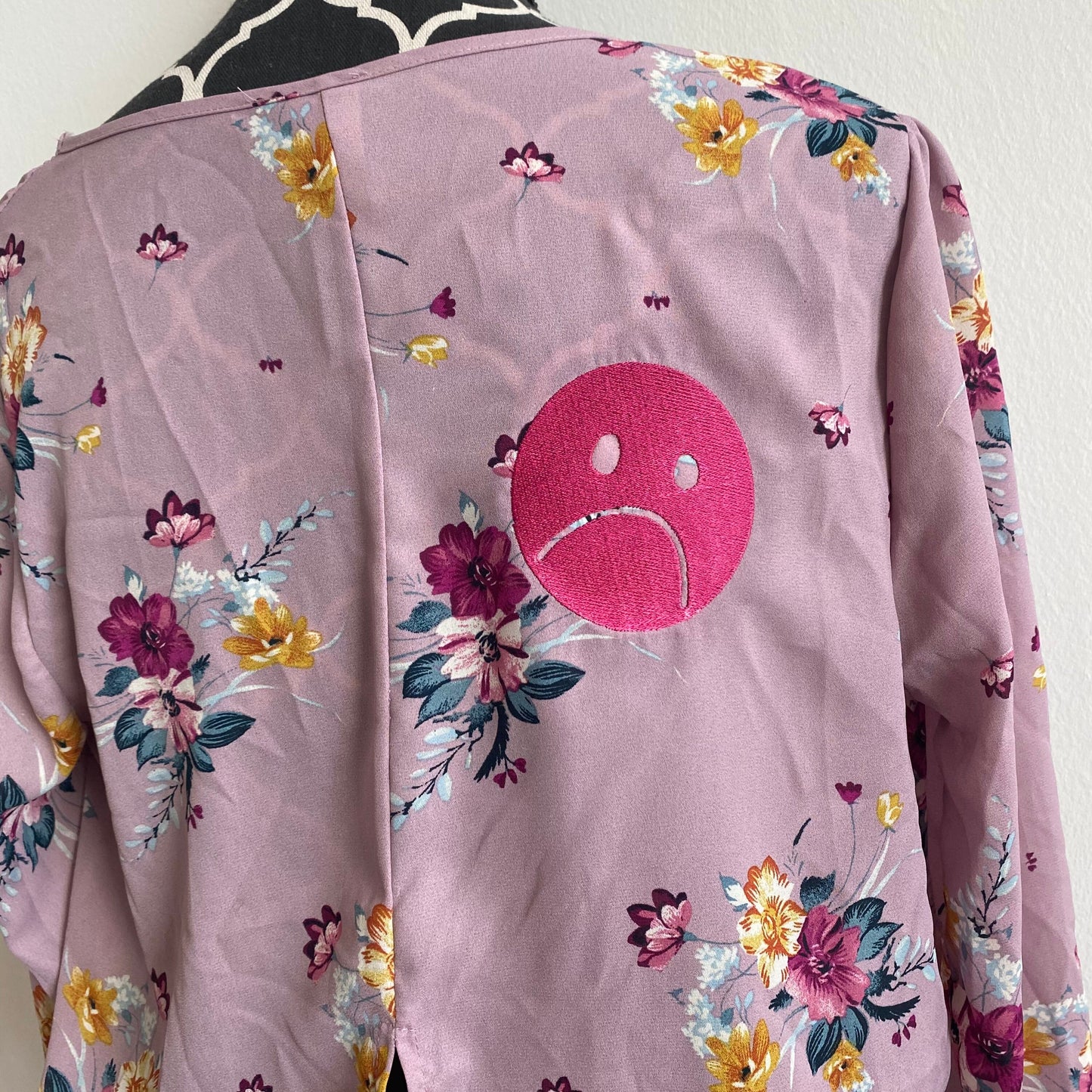 frownie floral shirt